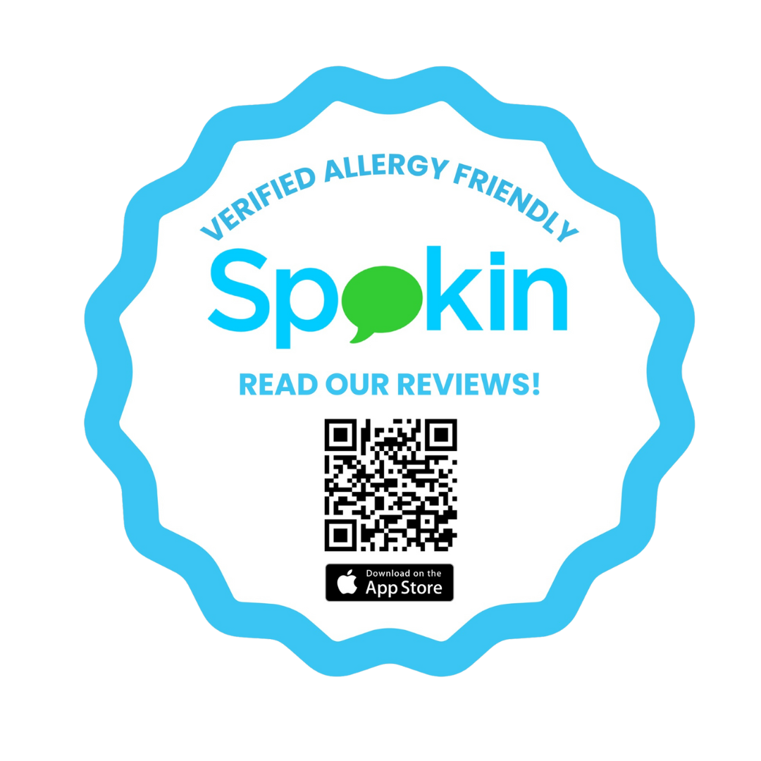 A badge with a light blue border featuring the words Verified Allergy Friendly and Spokin in the center. Text below reads Read Our Reviews! with a QR code and an Apple App Store logo. Besto is a nut free verified product by the allergy app Spokin.